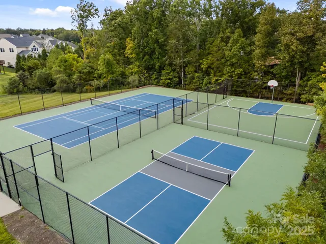 a view of a terrace with wooden floor and a city view