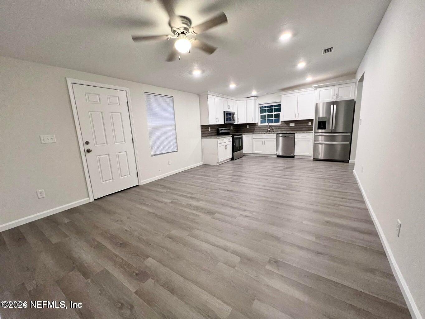 1961 New Haven Road Jacksonville, FL 32211 - Photo 13 of 53 a view of kitchen with wooden floor