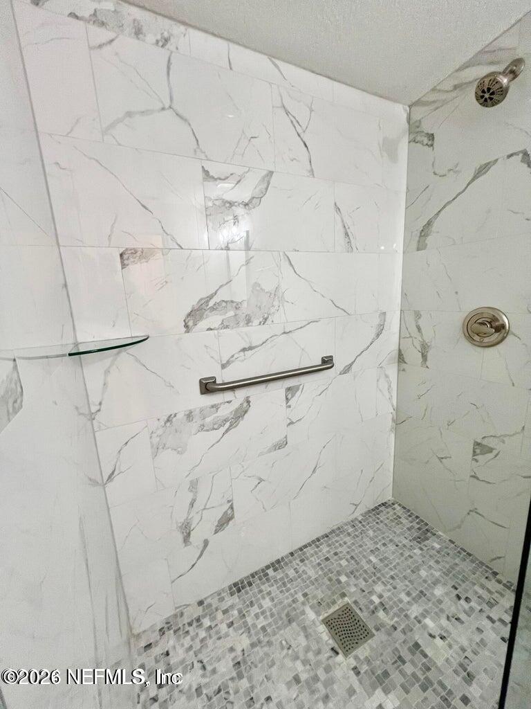 1961 New Haven Road Jacksonville, FL 32211 - Photo 20 of 53 a bathroom with a shower
