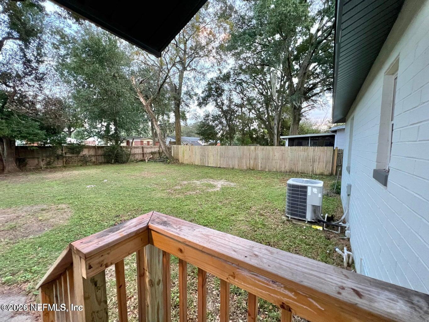 1961 New Haven Road Jacksonville, FL 32211 - Photo 43 of 53 a view of a backyard with a garden