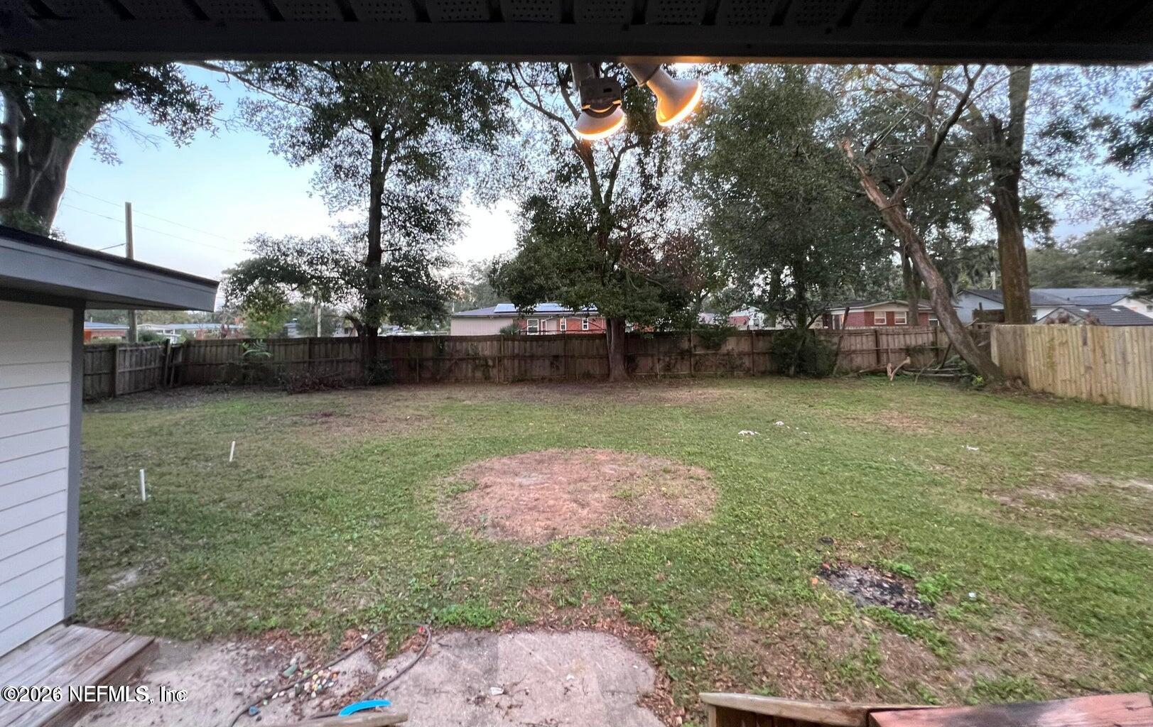 1961 New Haven Road Jacksonville, FL 32211 - Photo 44 of 53 a backyard of a house with lots of green space