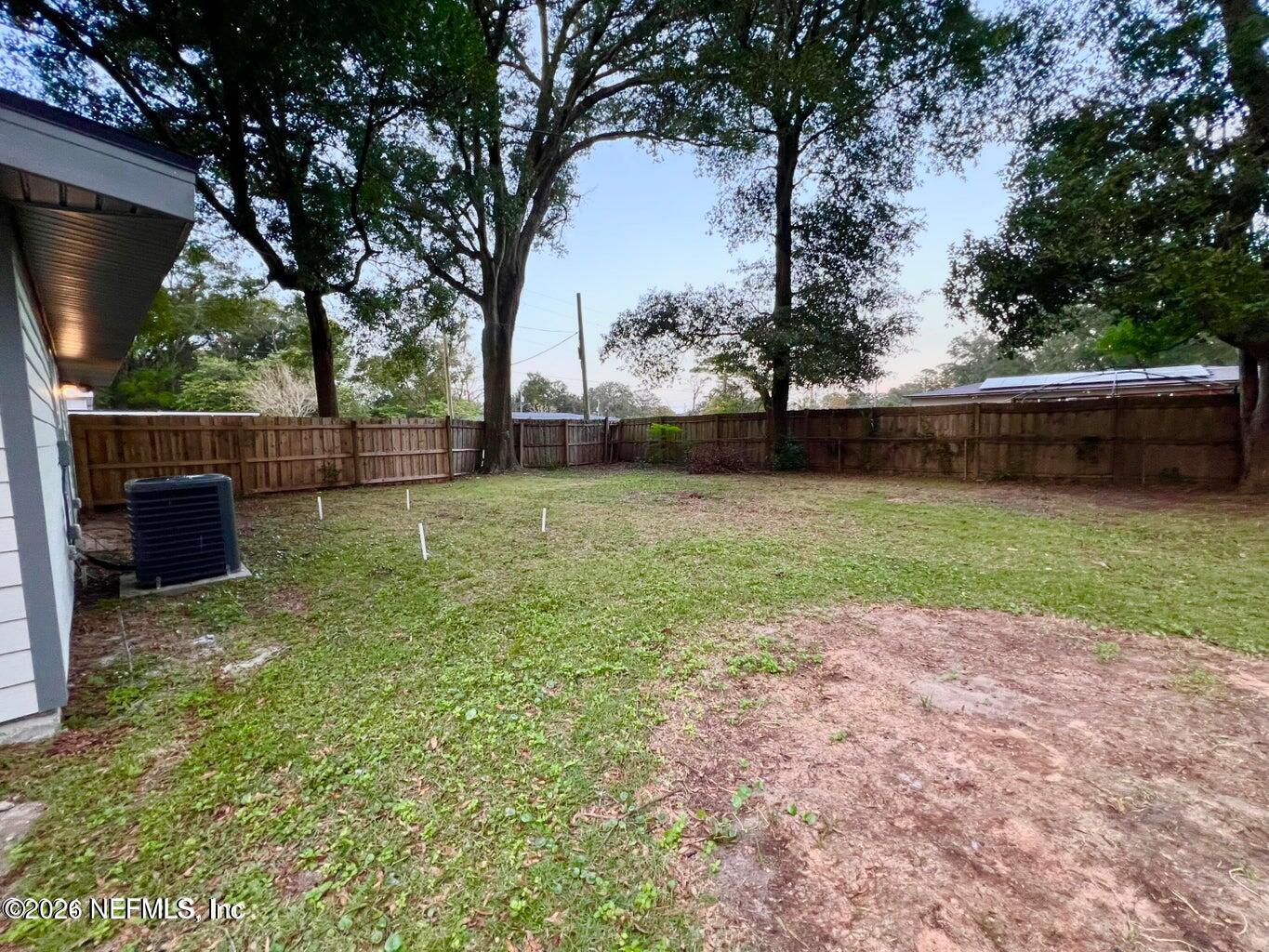 1961 New Haven Road Jacksonville, FL 32211 - Photo 46 of 53 a view of a backyard with large trees