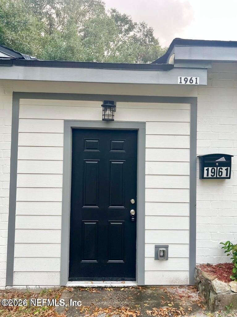 1961 New Haven Road Jacksonville, FL 32211 - Photo 49 of 53 a view of a wooden door