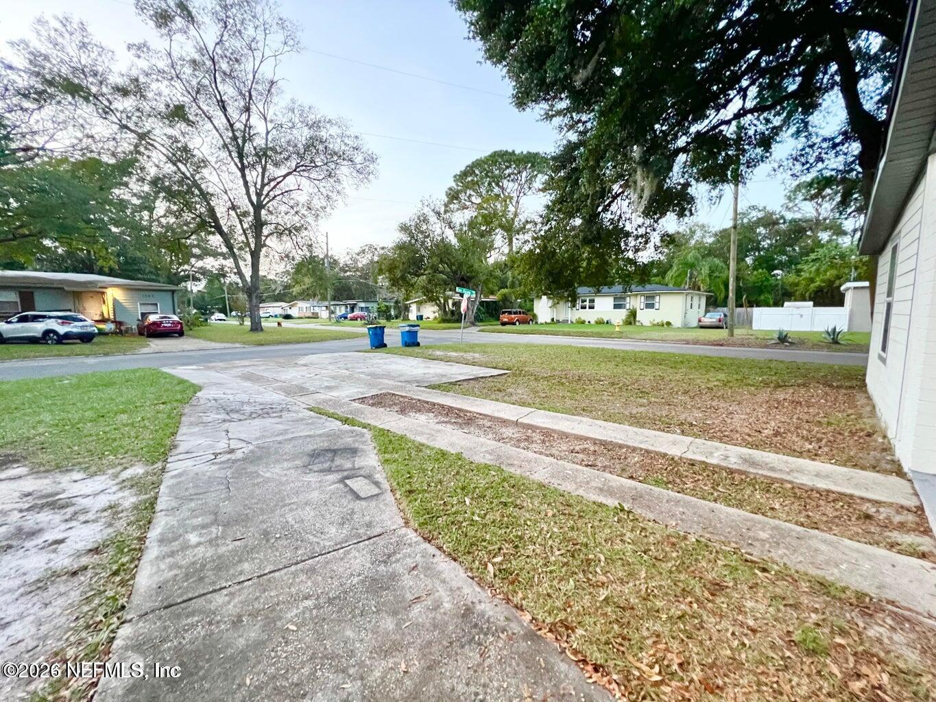 1961 New Haven Road Jacksonville, FL 32211 - Photo 50 of 53 a view of a yard with plants and trees