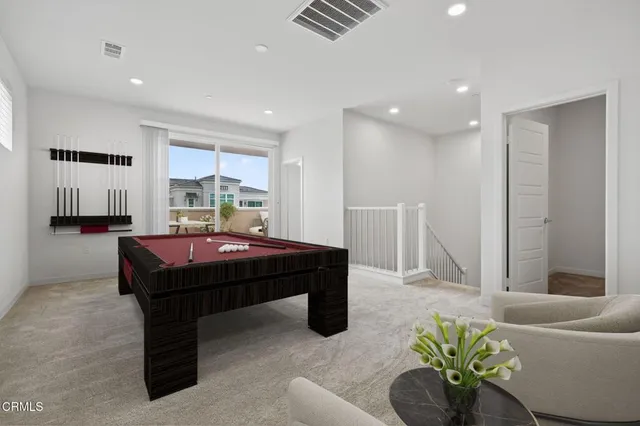 a bathroom with a sink a mirror and vanity