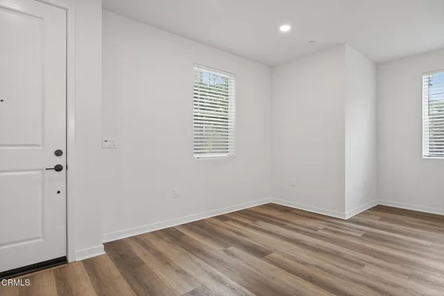 a view of kitchen with wooden floor
