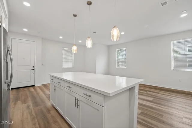 a view of a hallway with staircase