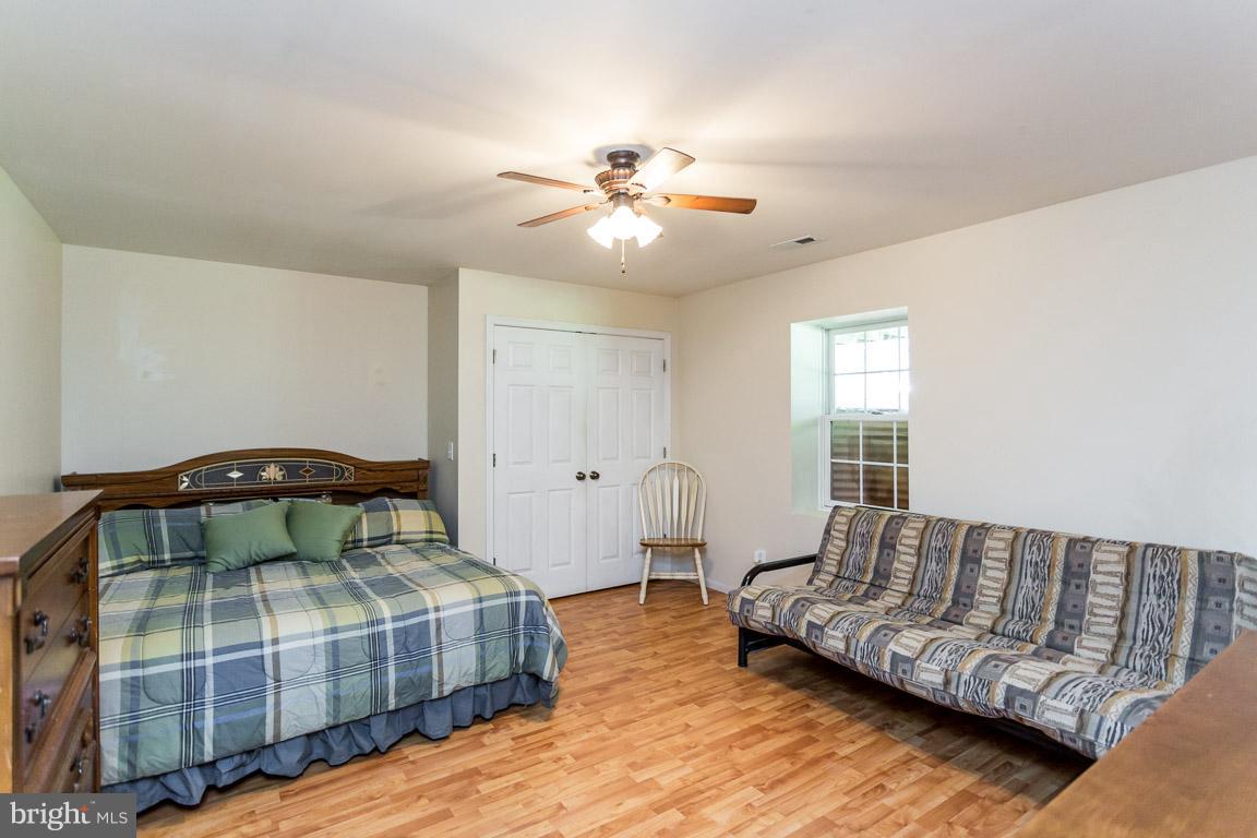 29259 Tatum Road Unionville, VA 22567 - Photo 7 of 12 Lower level bedroom 4 with laminate flooring.