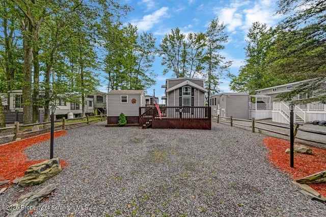 a view of a livingroom with furniture and a fireplace