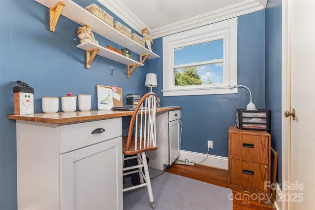 a kitchen with a window a sink and a refrigerator