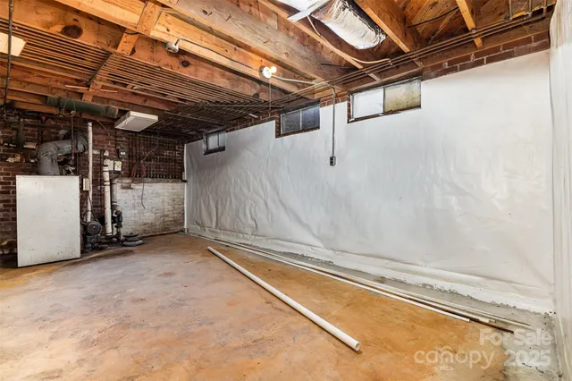 a view of a room with wooden walls