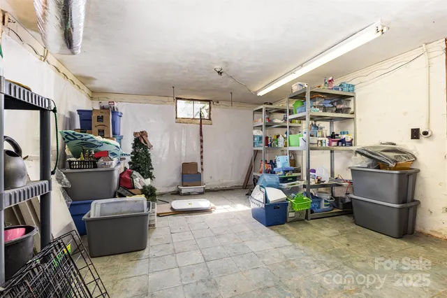 a room with furniture and a flat screen tv