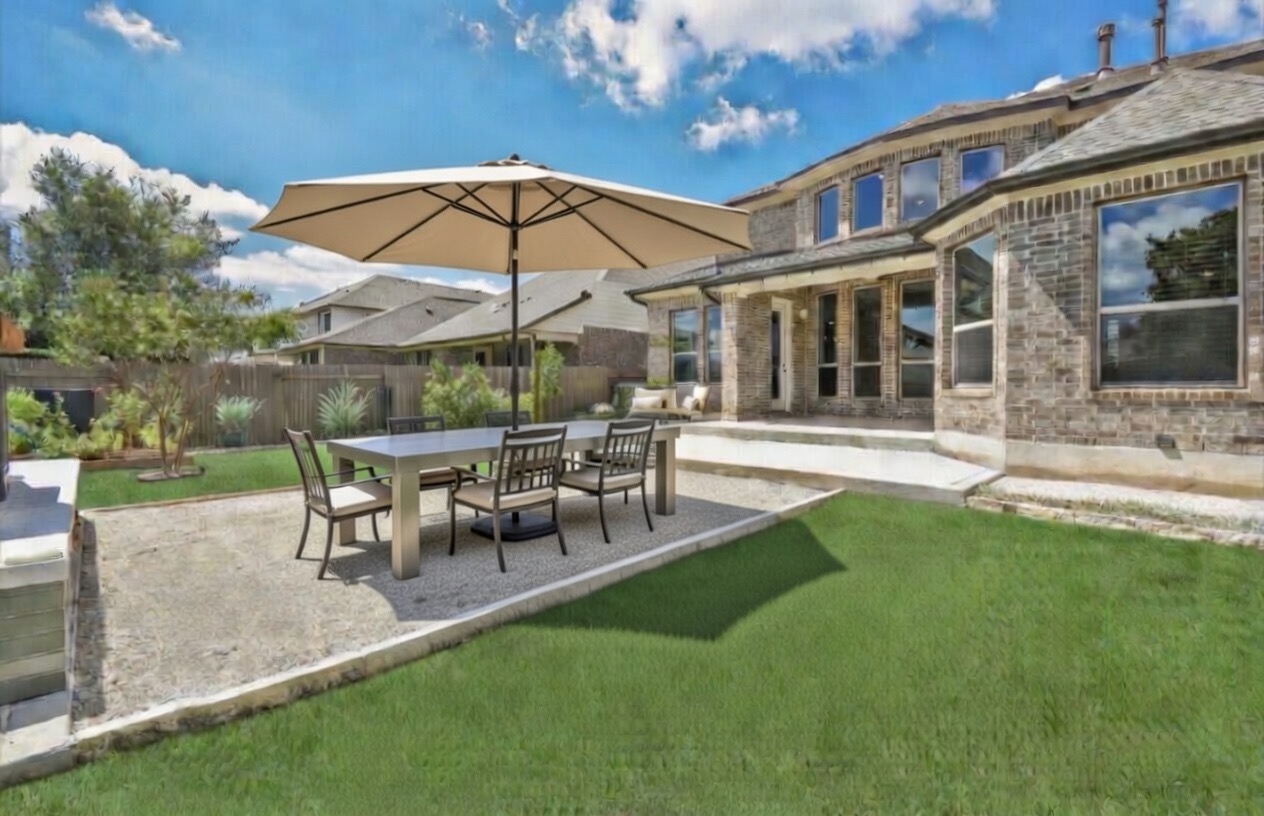 105 Potts Street Georgetown, TX 78628 - Photo 13 of 37 a view of a house with backyard and sitting area