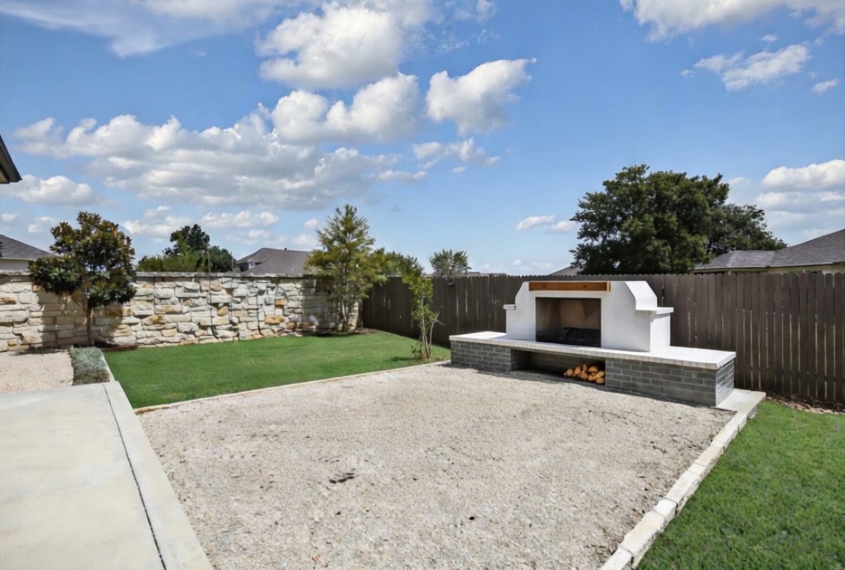 105 Potts Street Georgetown, TX 78628 - Photo 14 of 37 a view of a backyard