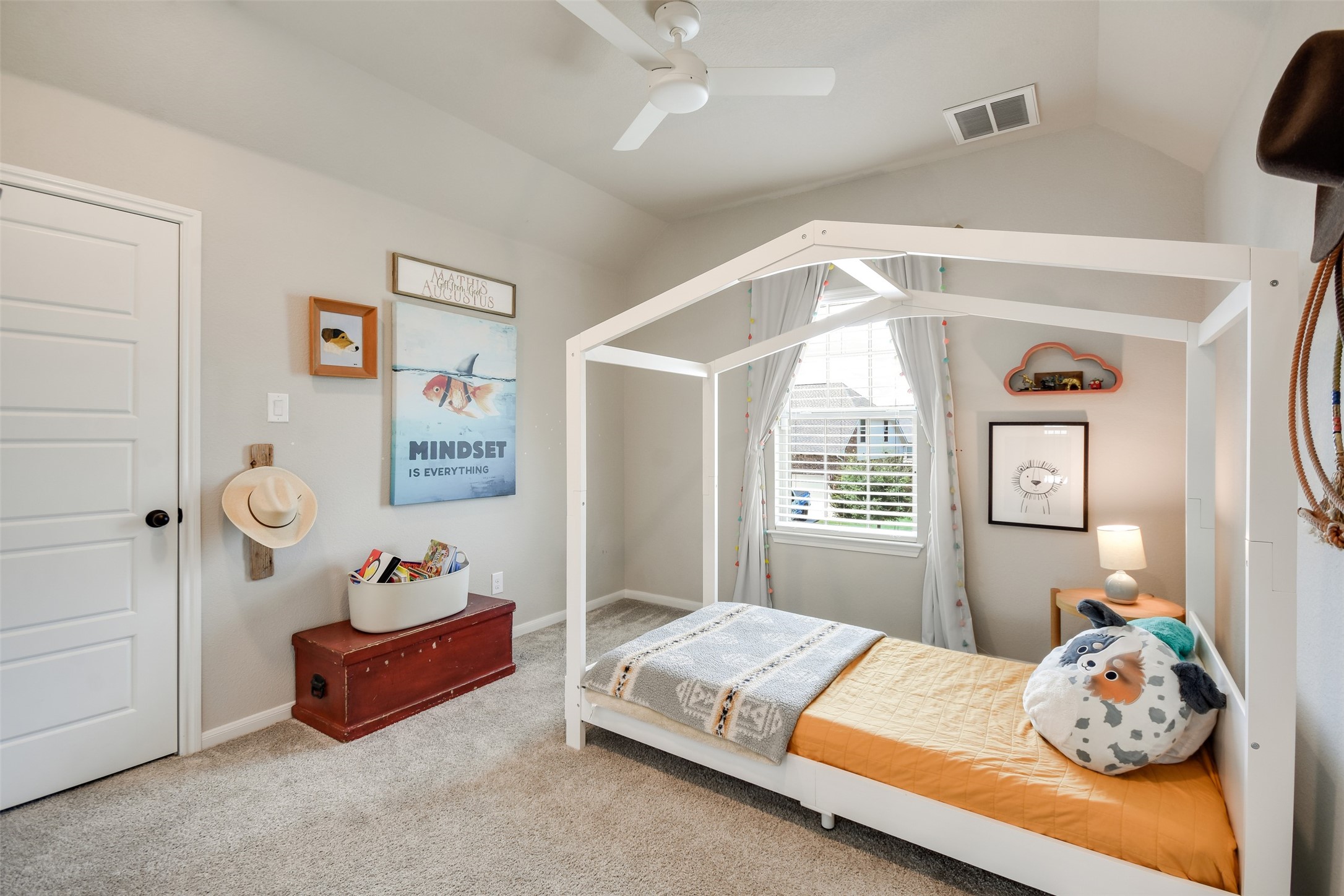 105 Potts Street Georgetown, TX 78628 - Photo 25 of 37 a bedroom with a bed and wooden floor