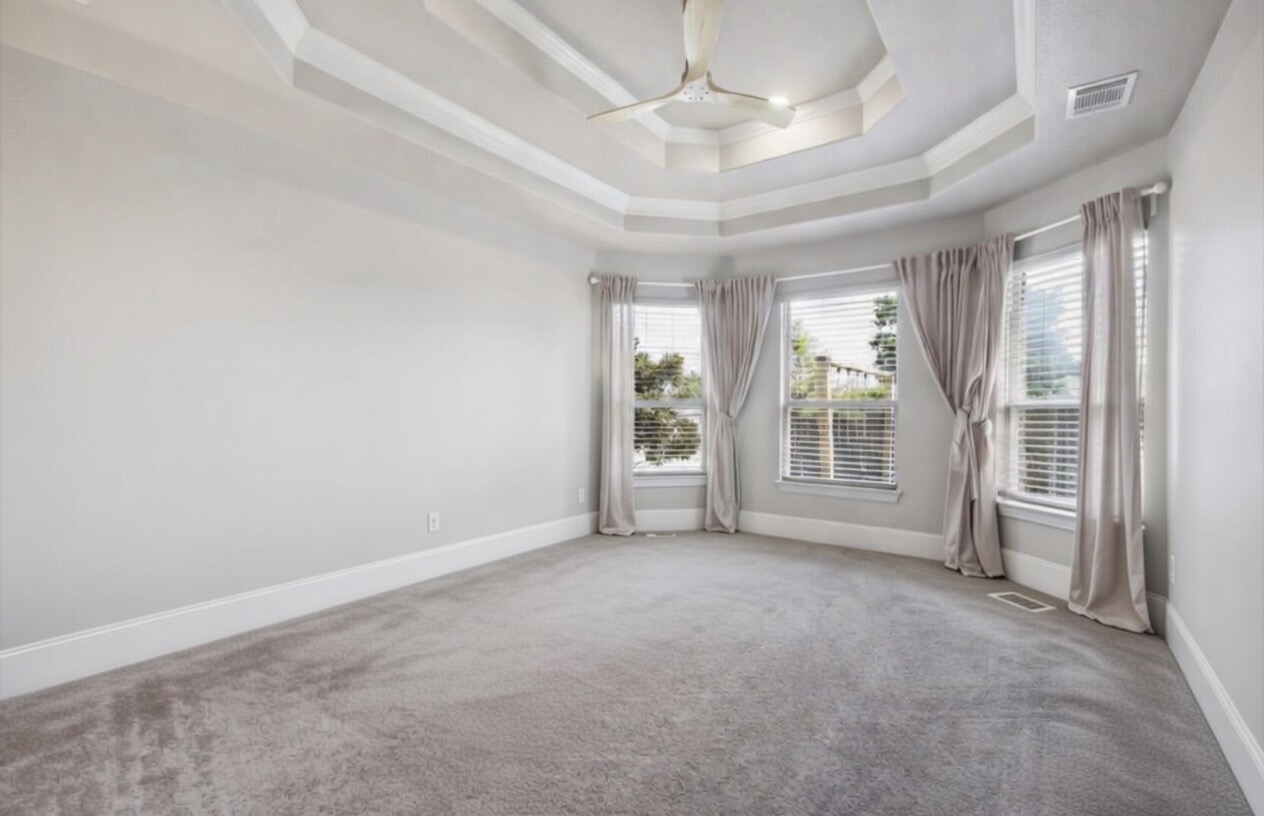 105 Potts Street Georgetown, TX 78628 - Photo 29 of 37 an empty room with windows