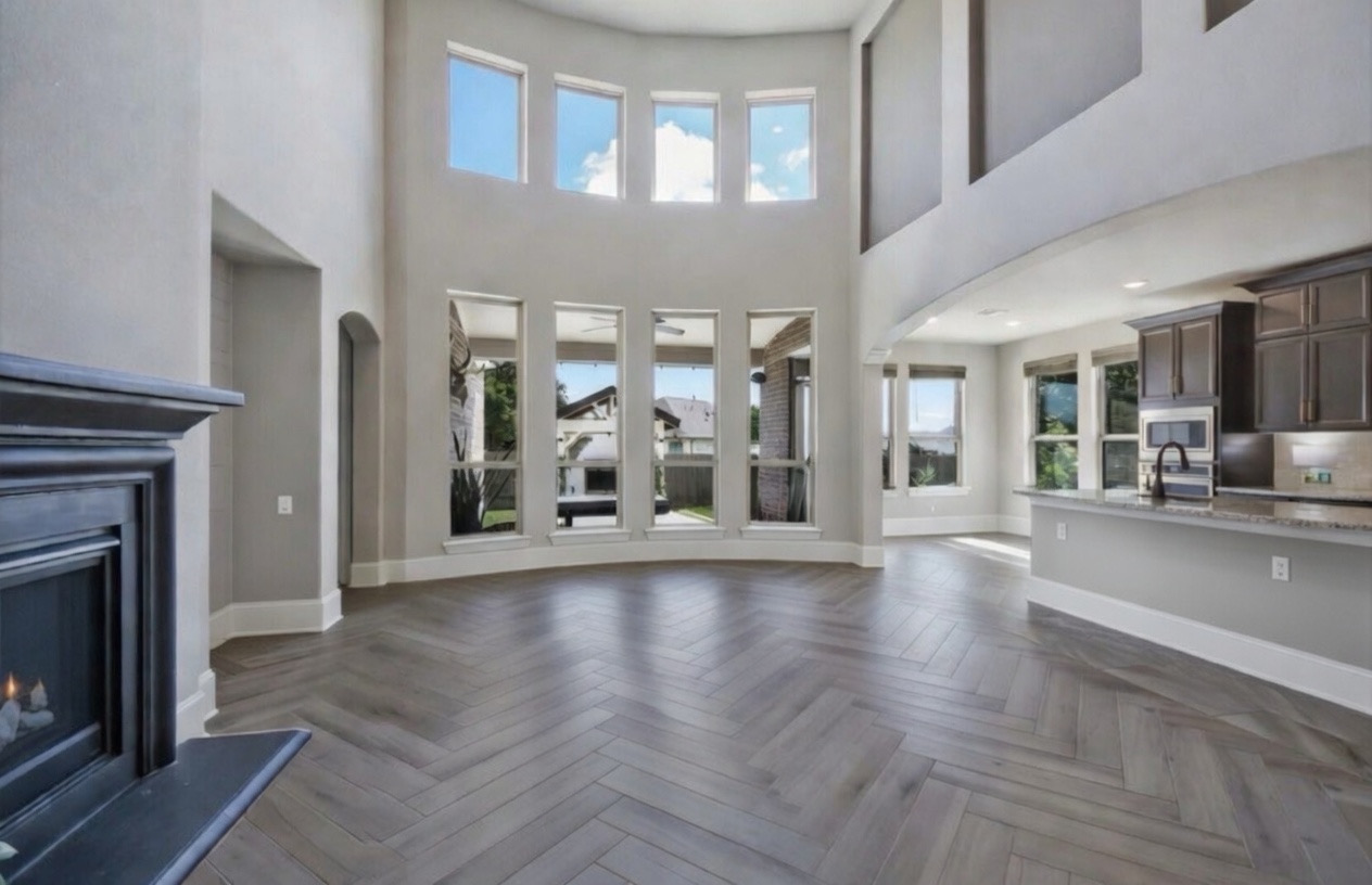 105 Potts Street Georgetown, TX 78628 - Photo 5 of 37 a view of a living room with furniture and a fireplace