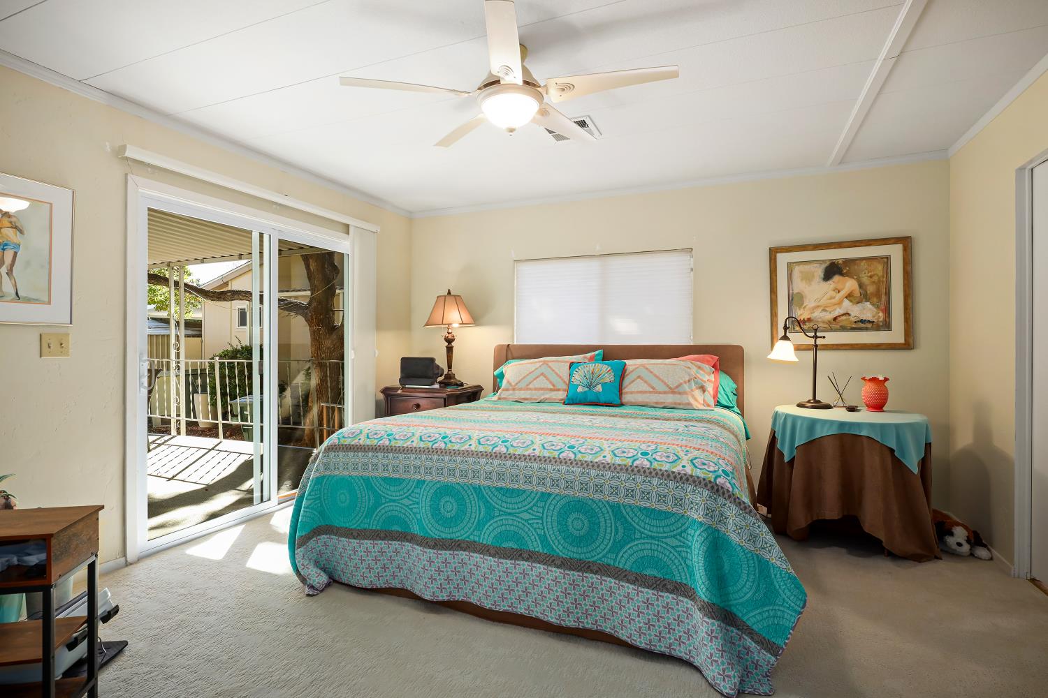 1330 Calaveritas Road, Unit 62 San Andreas, CA 95249 - Photo 24 of 47 a bedroom with a bed and a table