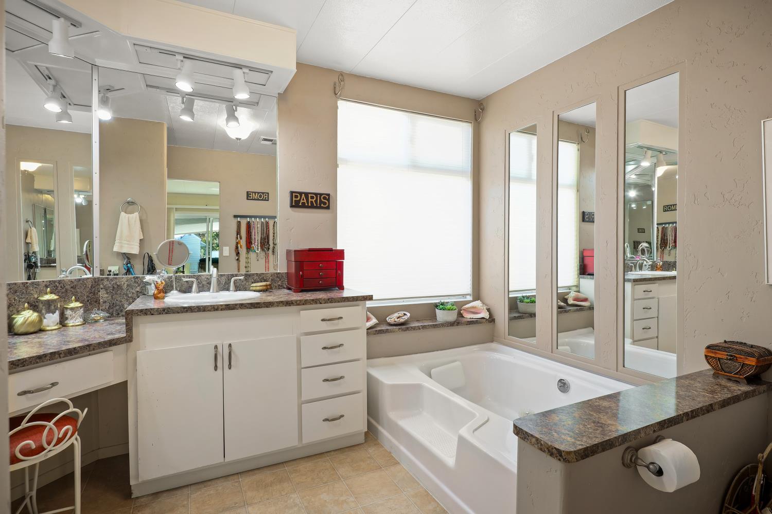 1330 Calaveritas Road, Unit 62 San Andreas, CA 95249 - Photo 27 of 47 a kitchen with a sink stove and cabinets