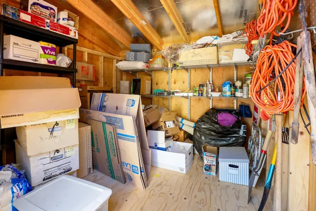 a view of a chairs and table in a patio