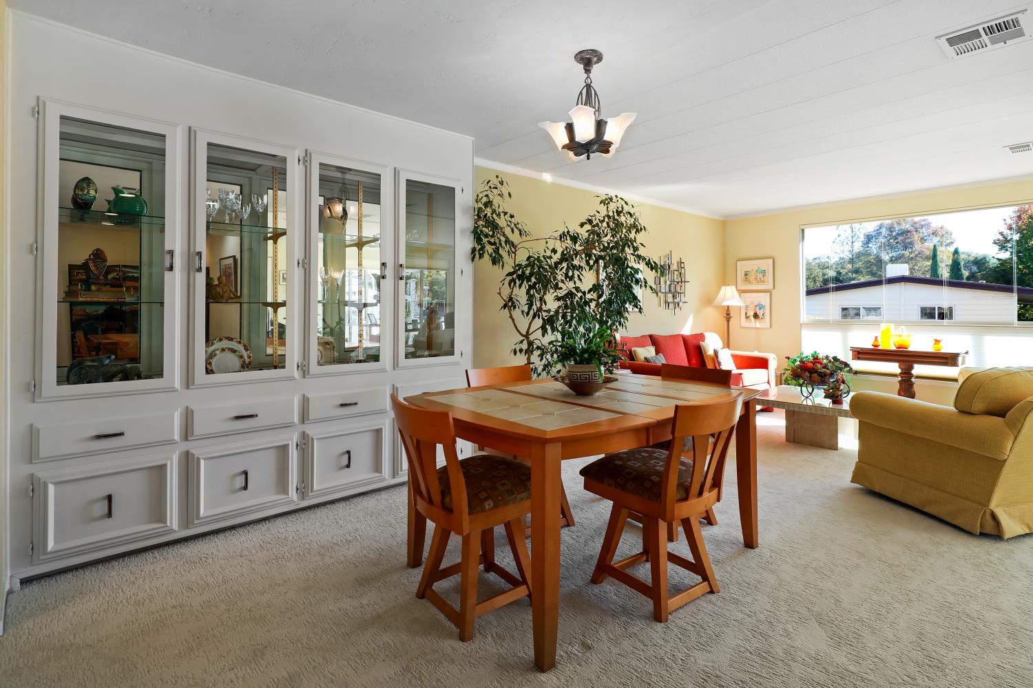 1330 Calaveritas Road, Unit 62 San Andreas, CA 95249 - Photo 7 of 47 a view of a dining room with furniture window and outside view