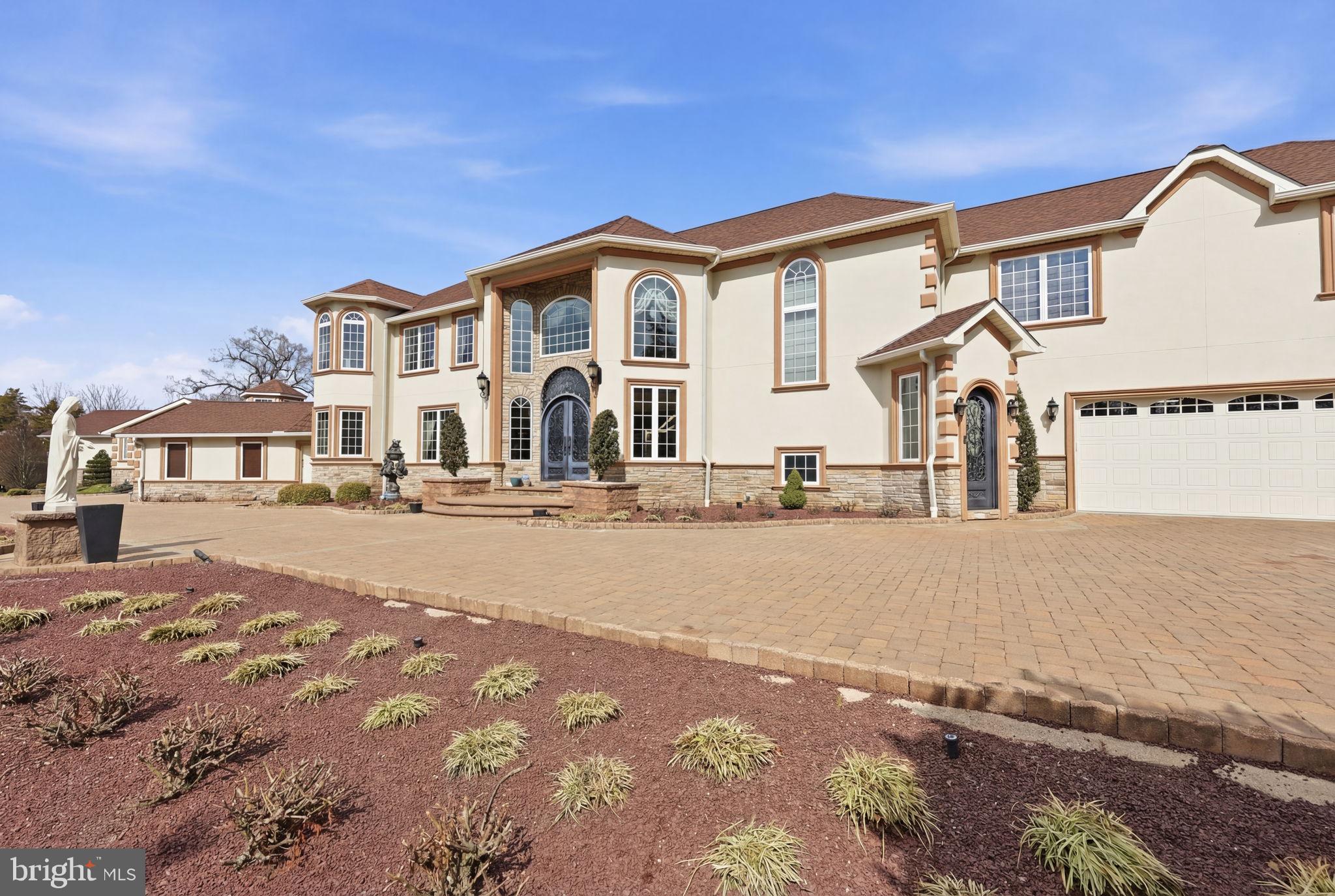 1066 Washington Crossing Road Washington Crossing, PA 18977 - Photo 1 of 92 a front view of a house with a street