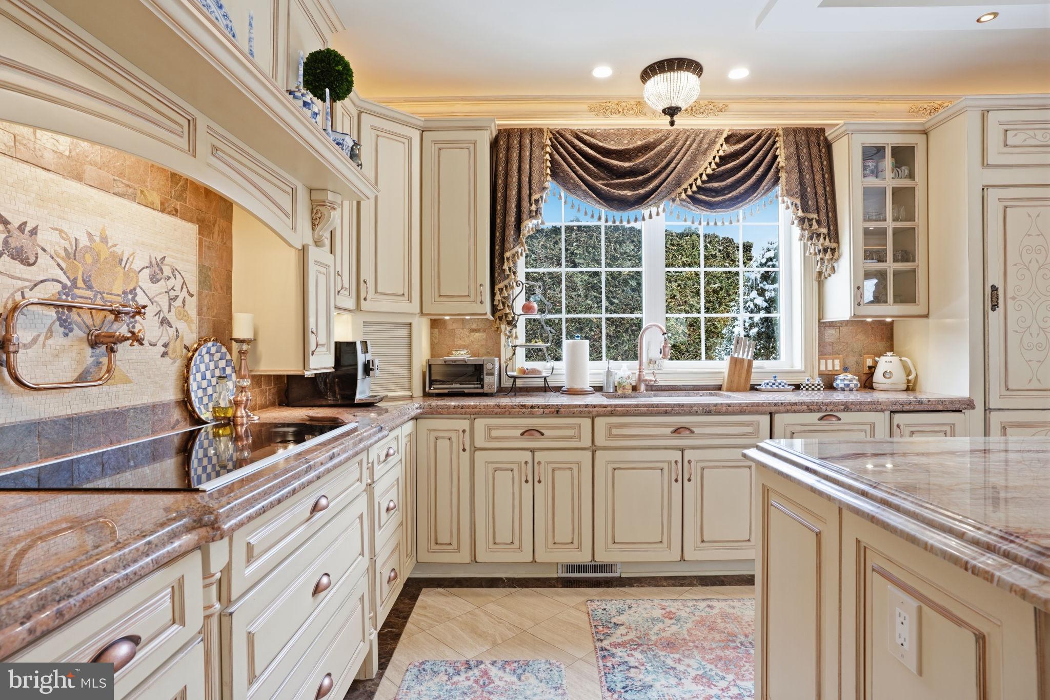 1066 Washington Crossing Road Washington Crossing, PA 18977 - Photo 13 of 92 a large kitchen with a sink and a stove
