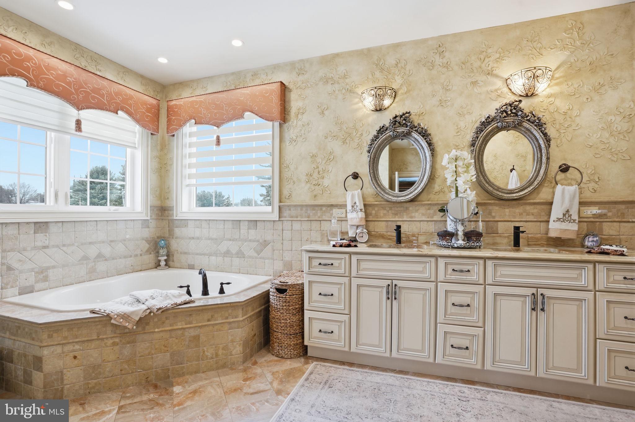 1066 Washington Crossing Road Washington Crossing, PA 18977 - Photo 27 of 92 a spacious bathroom with sinks mirror and a bathtub
