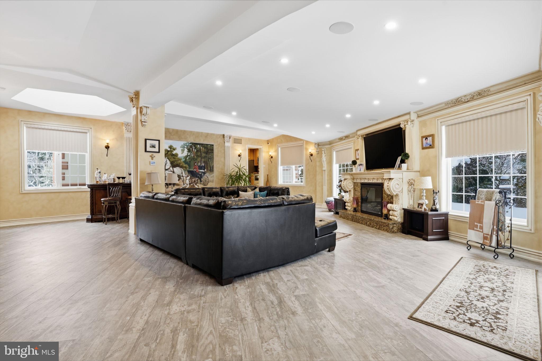 1066 Washington Crossing Road Washington Crossing, PA 18977 - Photo 30 of 92 a living room with furniture and a flat screen tv