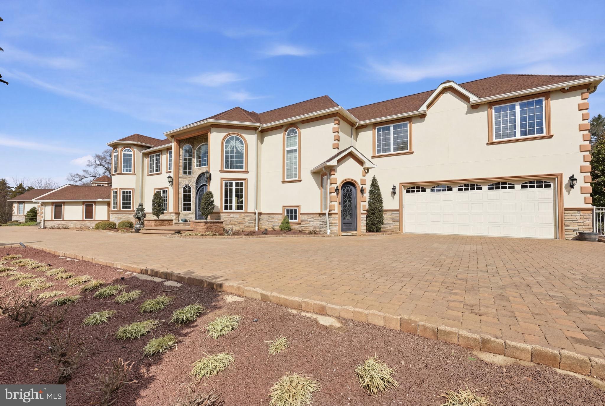 1066 Washington Crossing Road Washington Crossing, PA 18977 - Photo 3 of 92 a front view of a house with a street