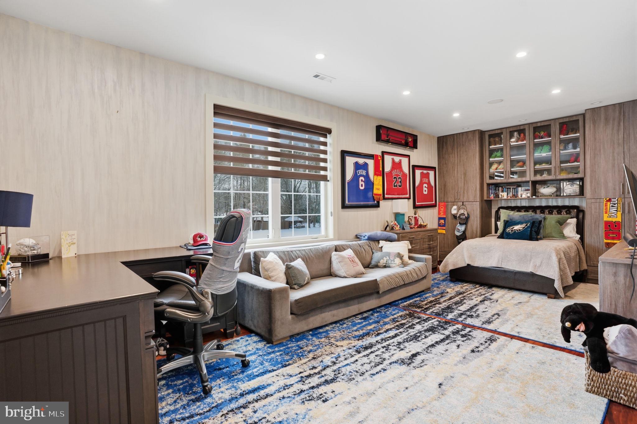 1066 Washington Crossing Road Washington Crossing, PA 18977 - Photo 38 of 92 a living room with furniture and a flat screen tv