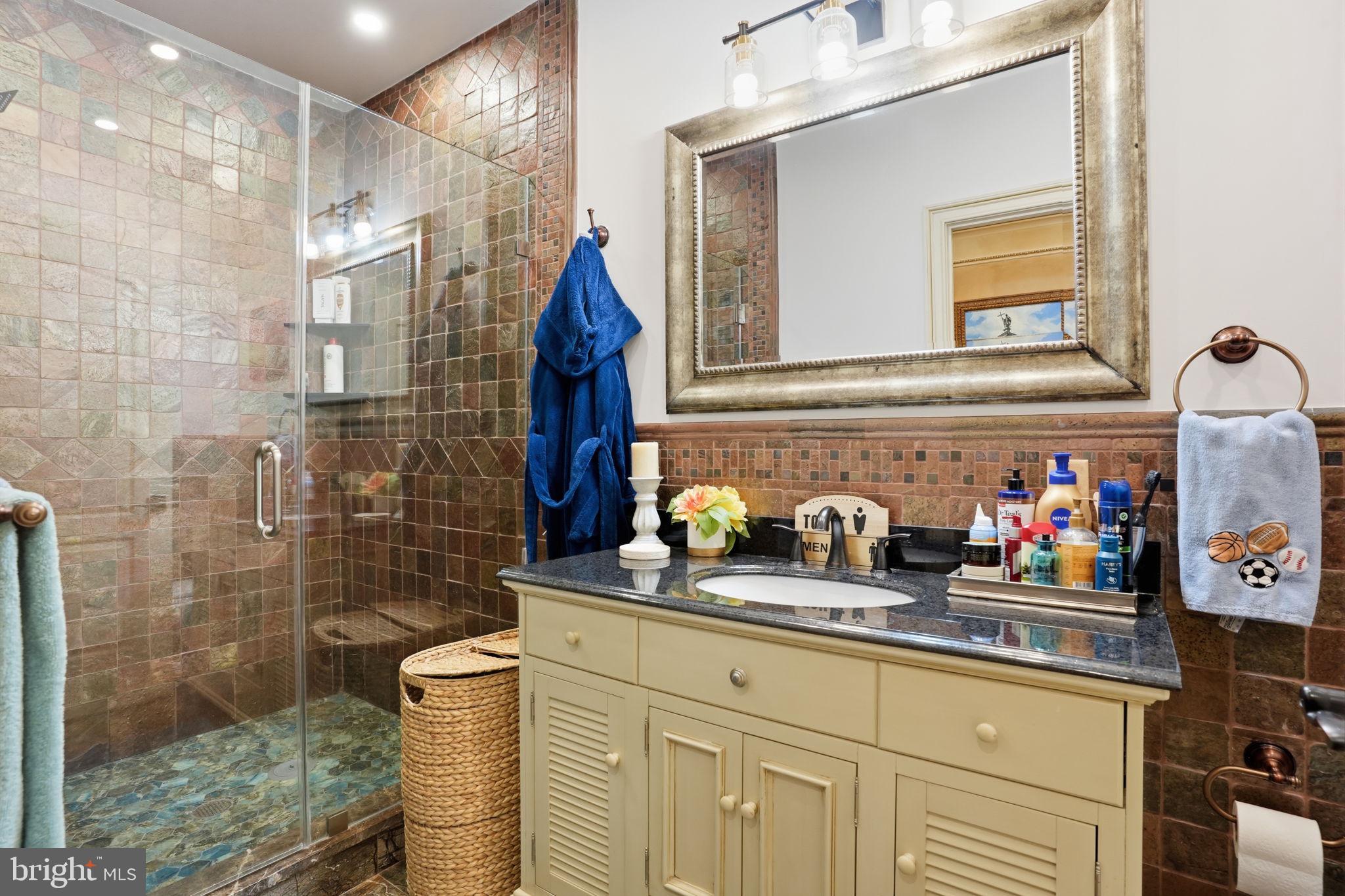 1066 Washington Crossing Road Washington Crossing, PA 18977 - Photo 40 of 92 a bathroom with a sink and a shower