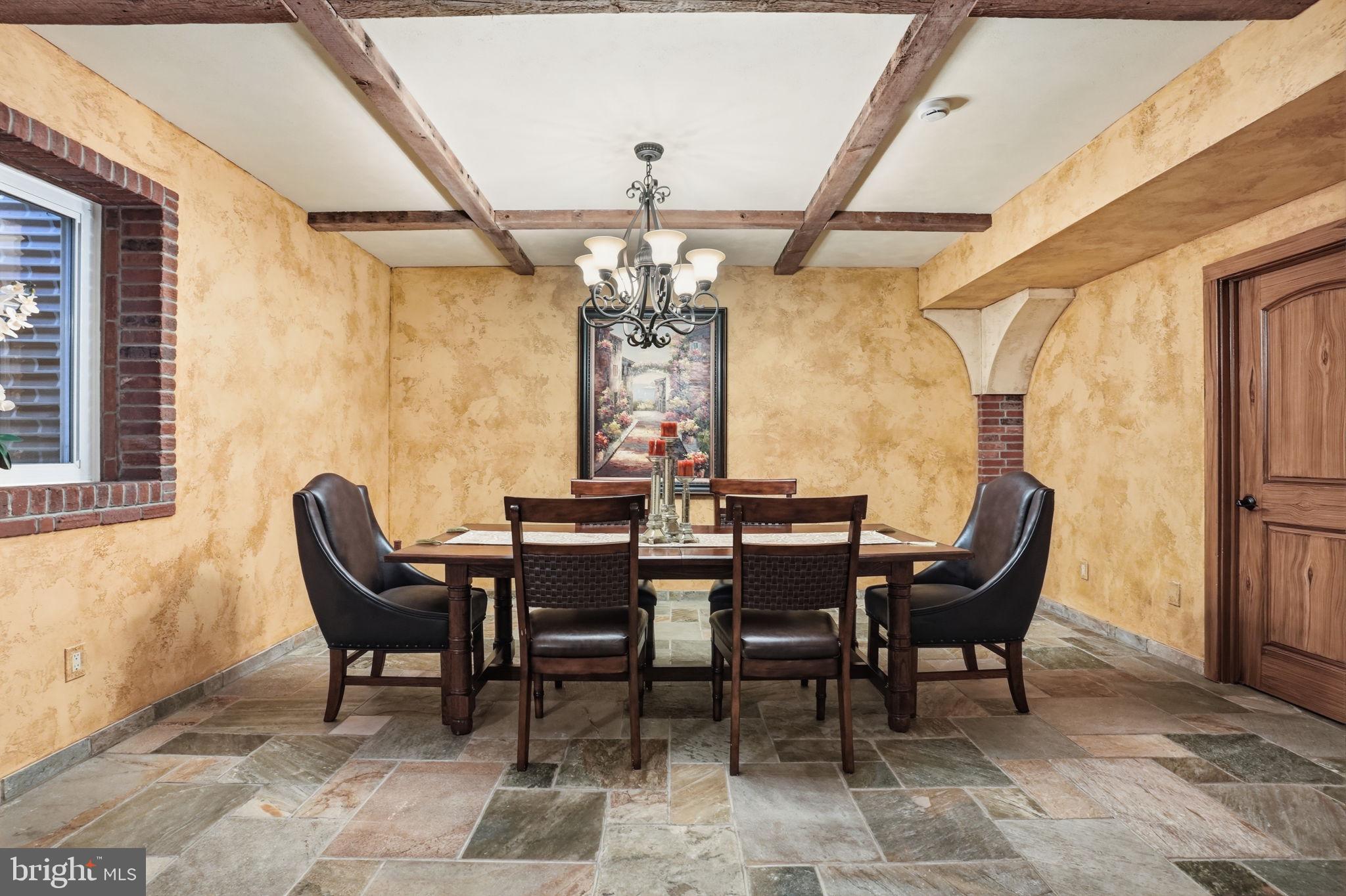 1066 Washington Crossing Road Washington Crossing, PA 18977 - Photo 61 of 92 a view of a dining room with furniture and chandelier
