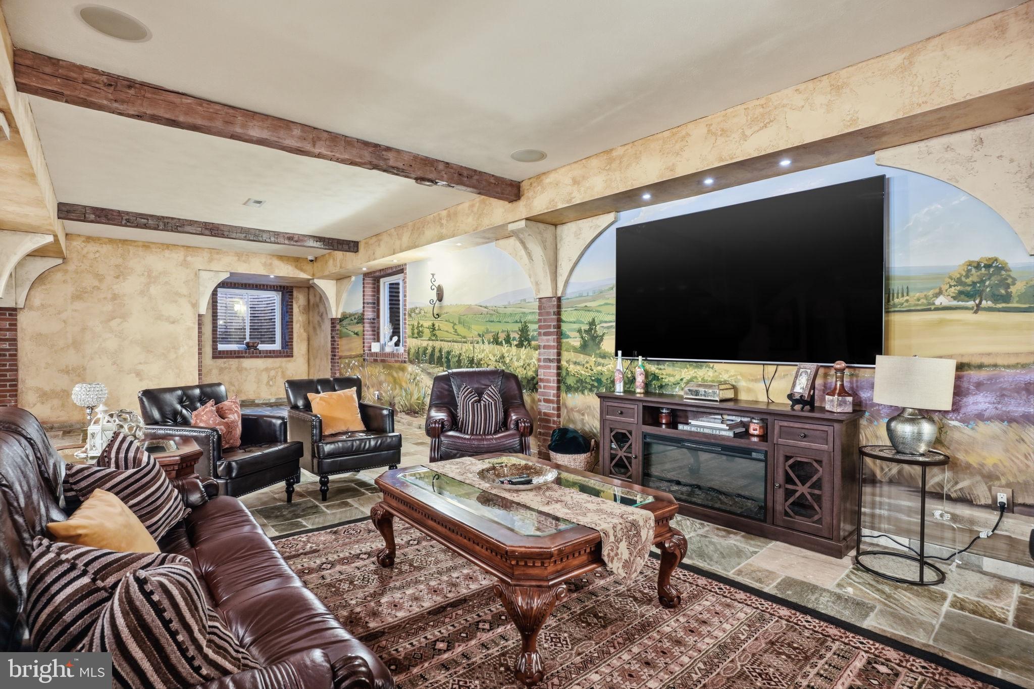 1066 Washington Crossing Road Washington Crossing, PA 18977 - Photo 63 of 92 a living room with furniture and a flat screen tv
