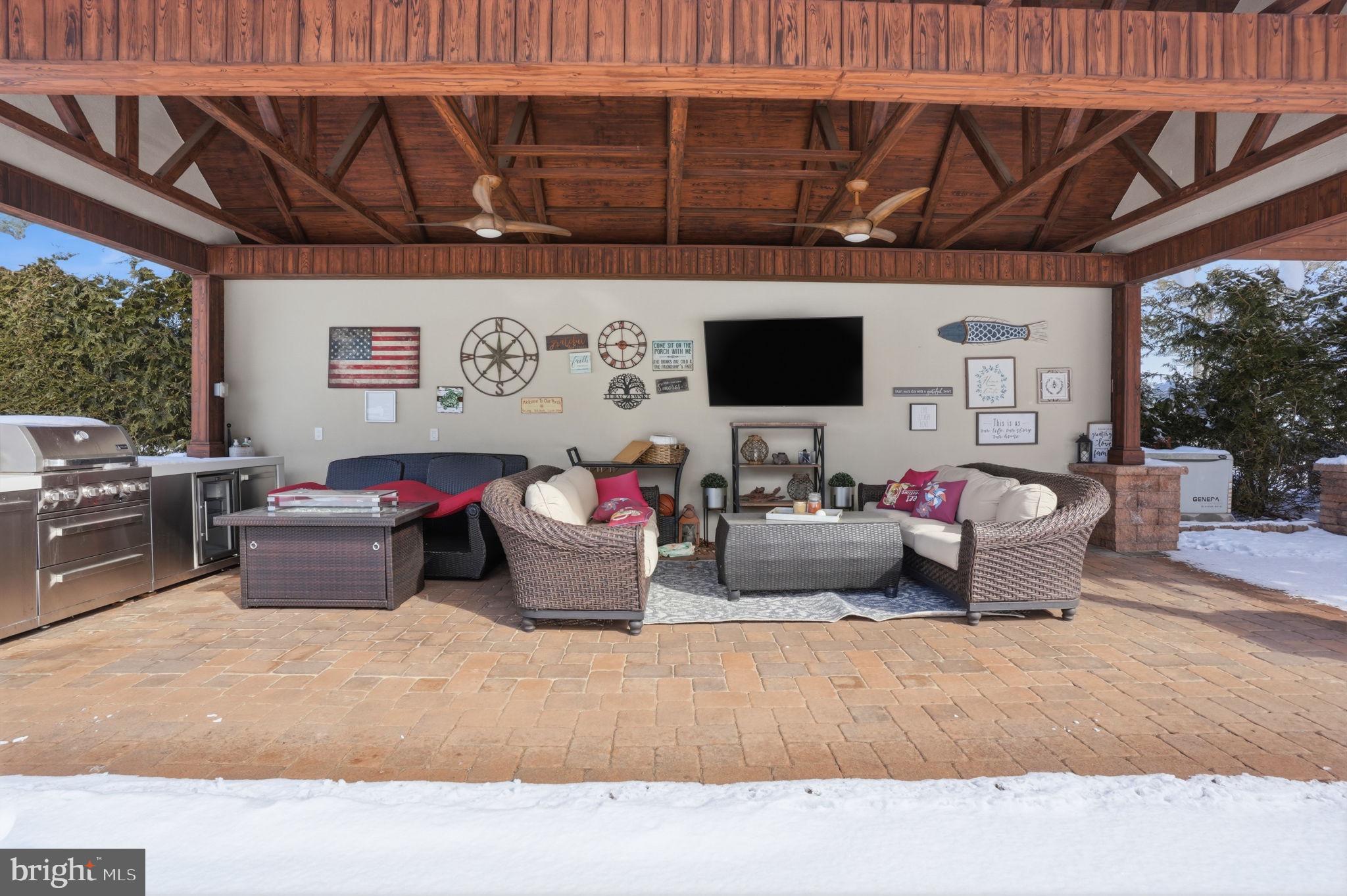 1066 Washington Crossing Road Washington Crossing, PA 18977 - Photo 75 of 92 a living room with furniture a flat screen tv and a window