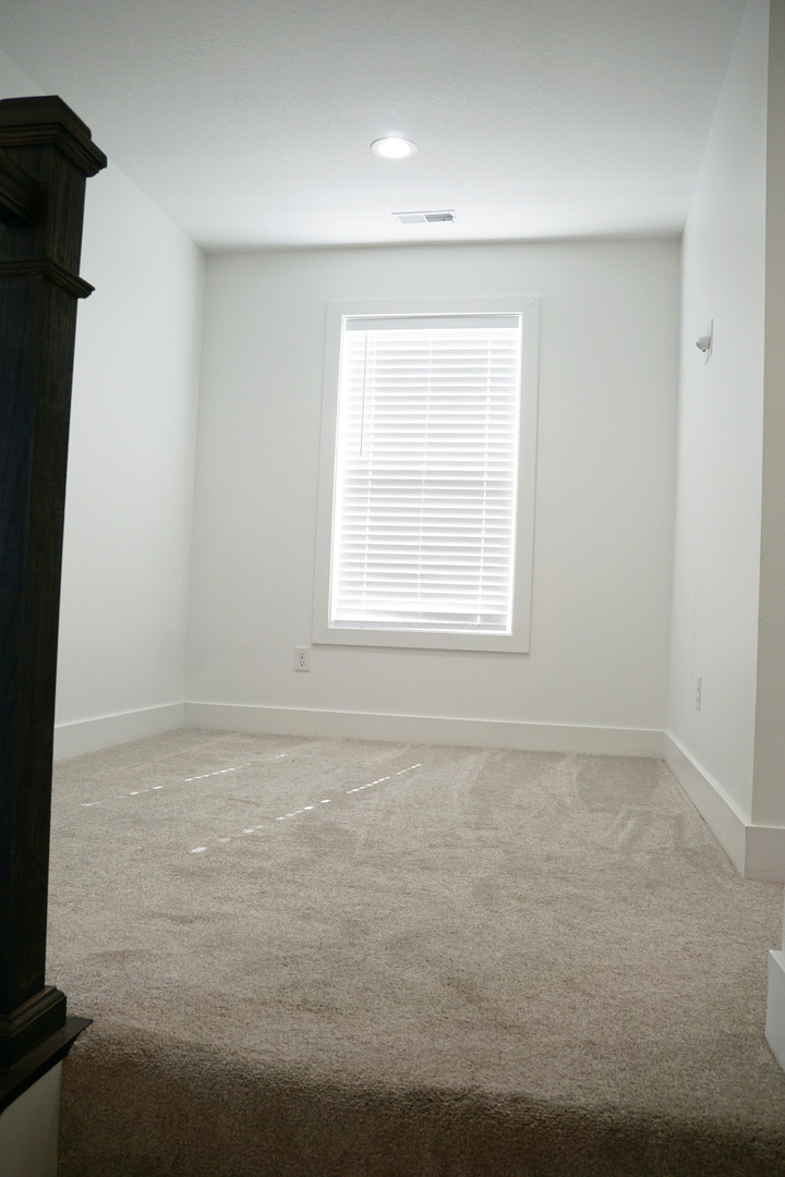 752 Kristin Drive Normal, IL 61761 - Photo 16 of 36 an empty room with a window