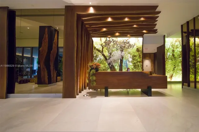 a view of two chairs in the balcony