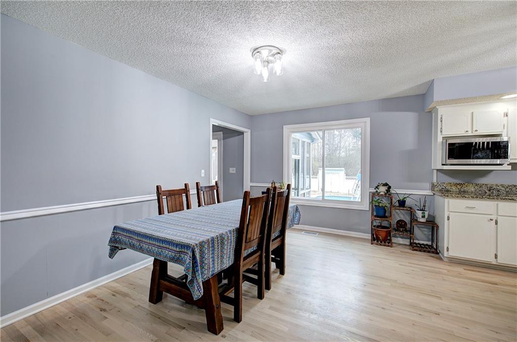 16 High Point Drive Southwest Cartersville, GA 30120 - Photo 12 of 44 a living room with furniture and wooden floor