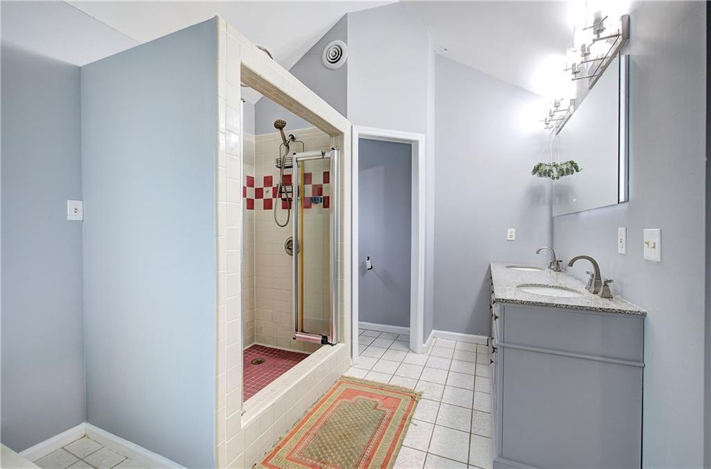 16 High Point Drive Southwest Cartersville, GA 30120 - Photo 28 of 44 a en suite bathroom with a sink and mirror