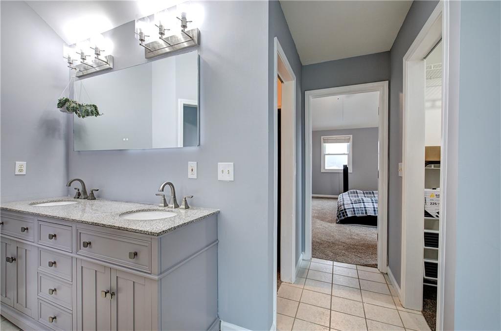 16 High Point Drive Southwest Cartersville, GA 30120 - Photo 29 of 44 a en suite bathroom with a sink and a mirror