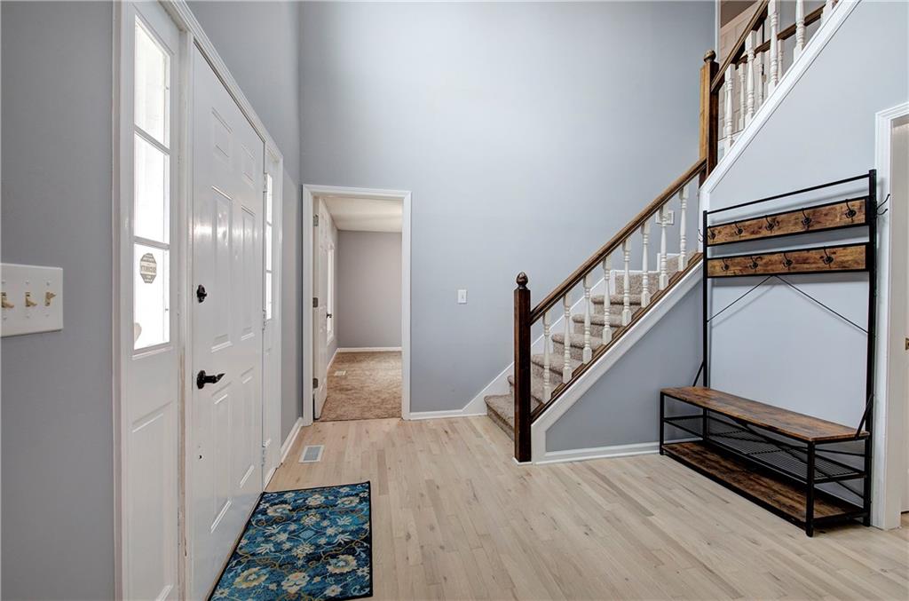 16 High Point Drive Southwest Cartersville, GA 30120 - Photo 3 of 44 a view of hallway with stairs