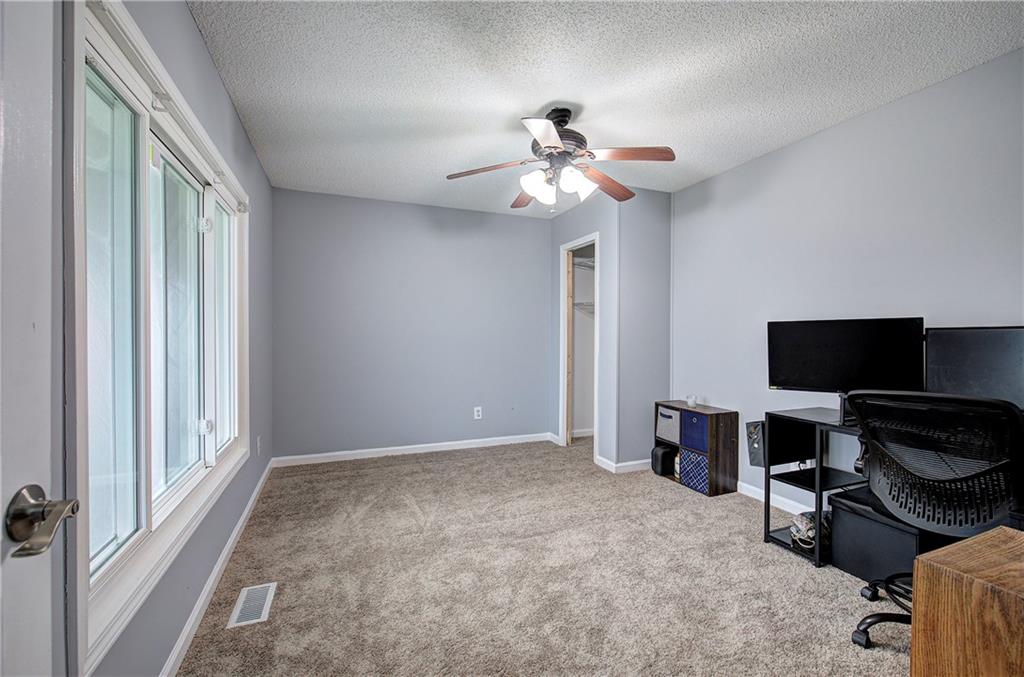 16 High Point Drive Southwest Cartersville, GA 30120 - Photo 4 of 44 a view of a livingroom with workspace and a window