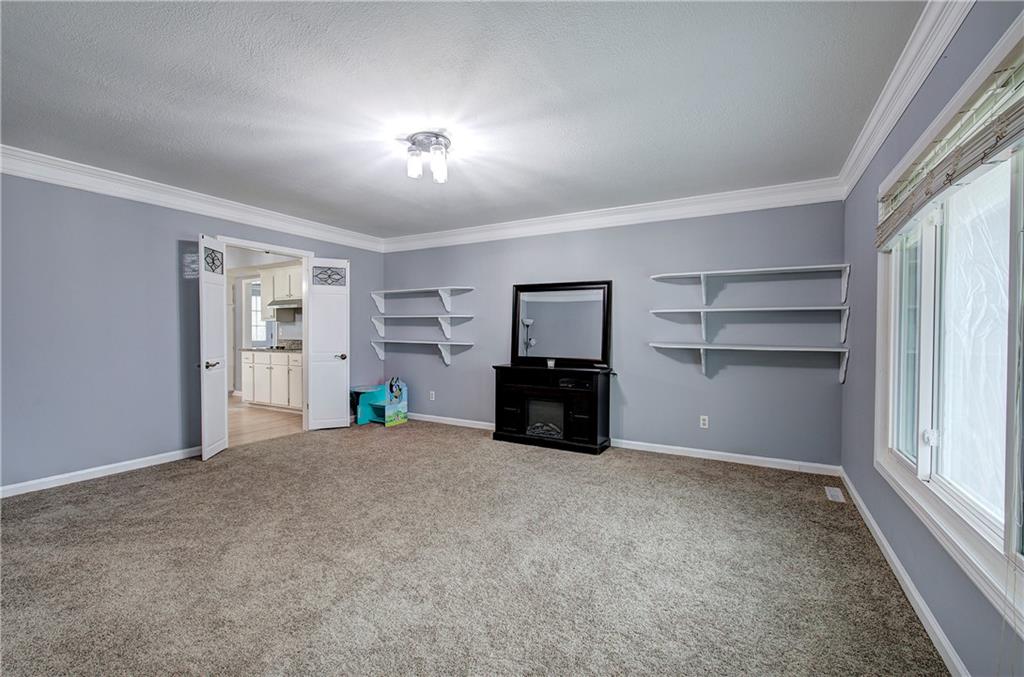 16 High Point Drive Southwest Cartersville, GA 30120 - Photo 8 of 44 a view of an empty room with a window