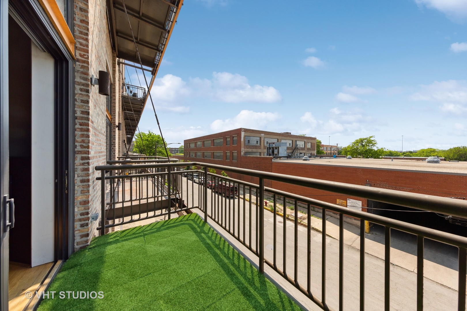 2545 South Dearborn Street, Unit 331 Chicago, IL 60616 - Photo 15 of 17 a view of city from a balcony