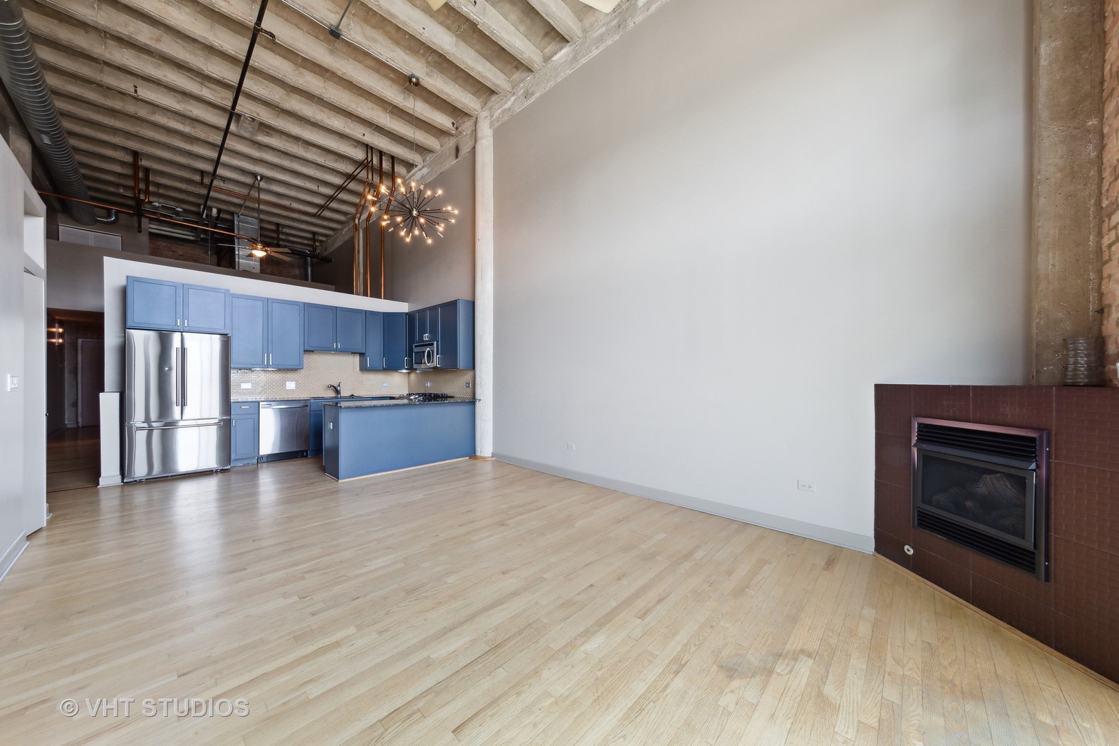 2545 South Dearborn Street, Unit 331 Chicago, IL 60616 - Photo 4 of 17 a view of kitchen and kitchen with furniture
