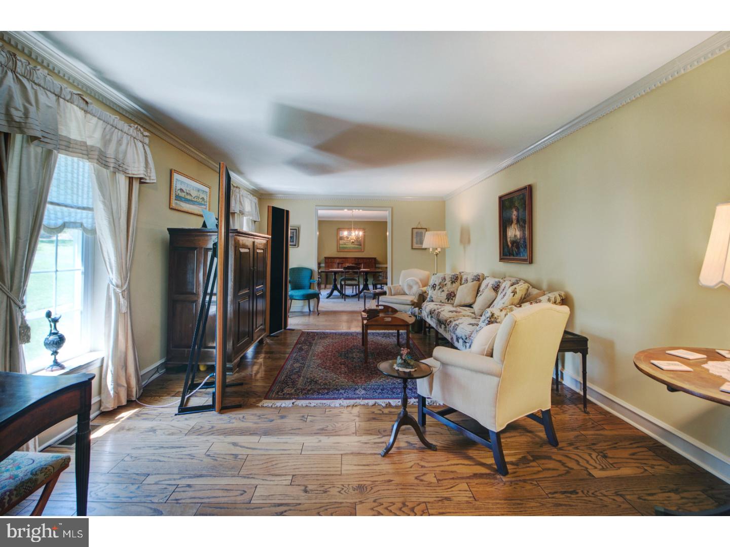 2841 Furlong Road Doylestown, PA 18902 - Photo 4 of 20 a living room with furniture and a wooden floor