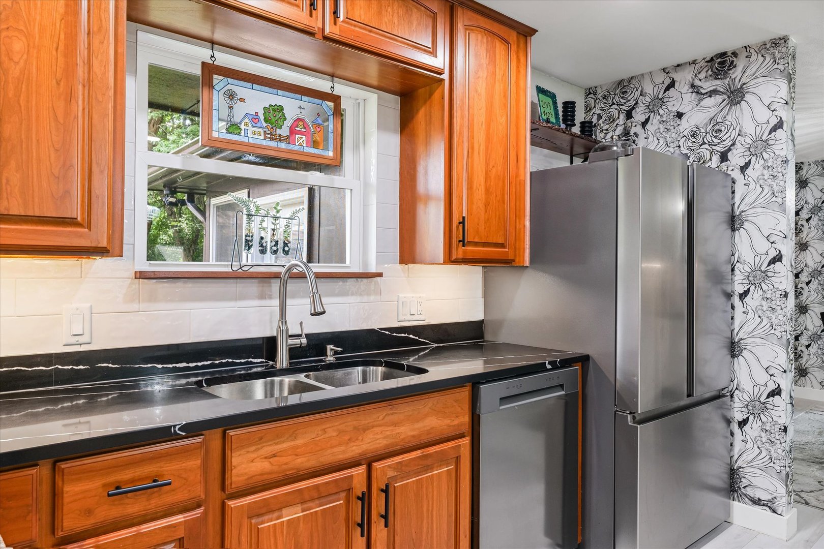 5 Golfview Drive Savoy, IL 61874 - Photo 15 of 42 a kitchen with stainless steel appliances a sink and a refrigerator