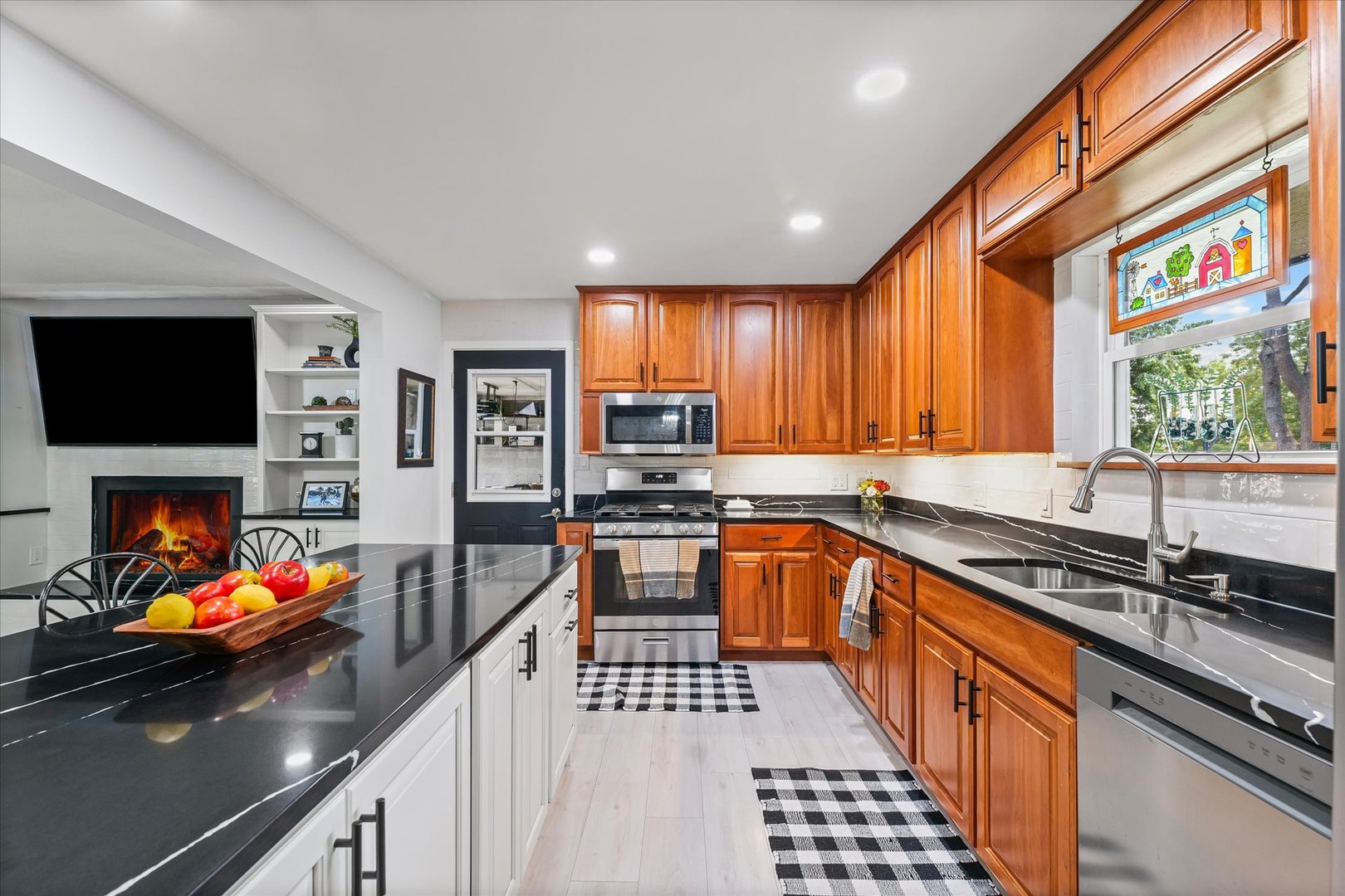 5 Golfview Drive Savoy, IL 61874 - Photo 16 of 42 a kitchen with stainless steel appliances a sink stove and cabinets