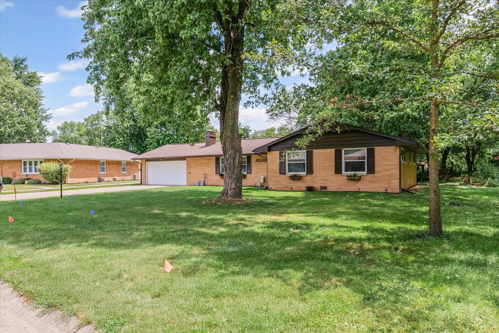 5 Golfview Drive Savoy, IL 61874 - Photo 3 of 42 a front view of house with yard and green space
