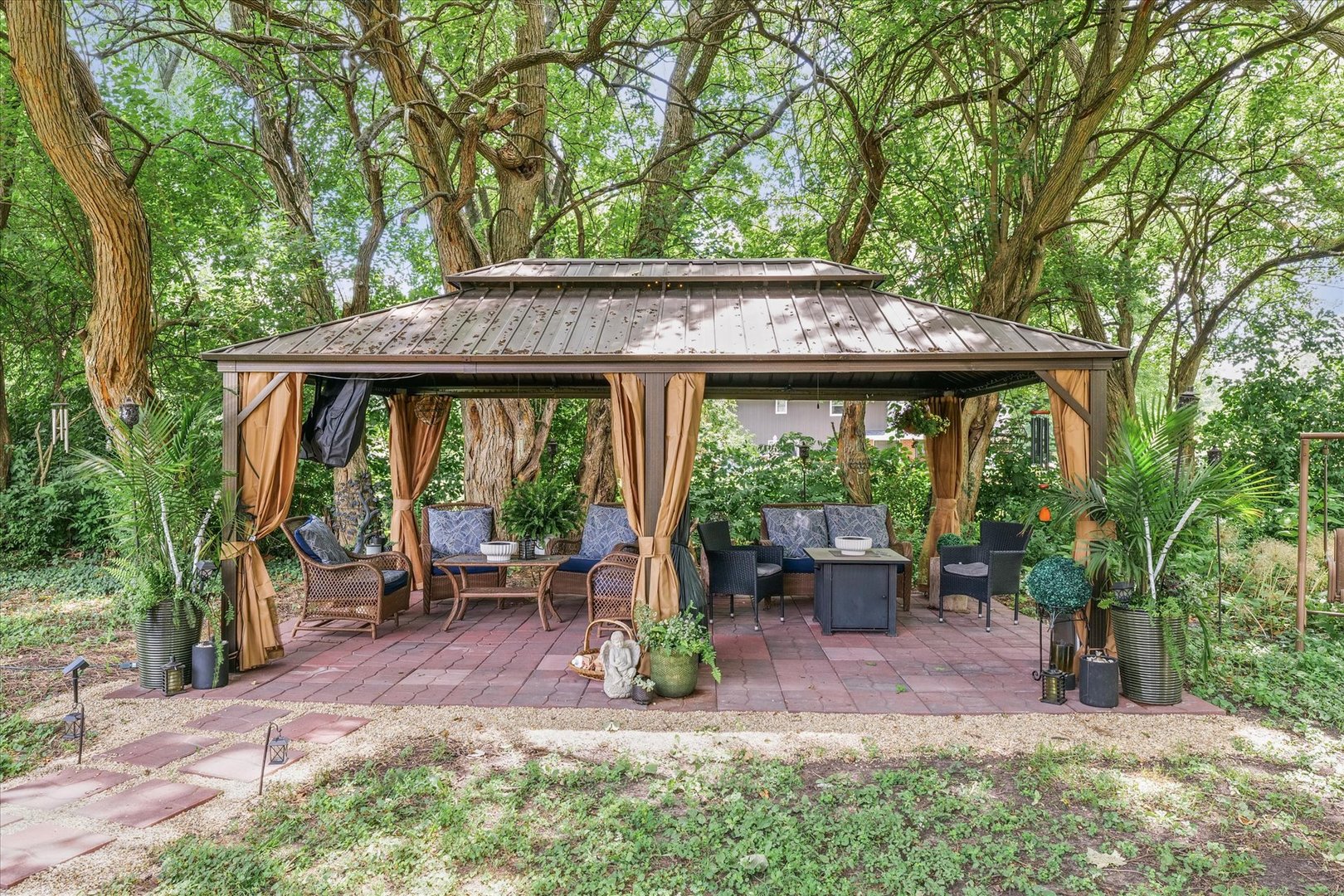 5 Golfview Drive Savoy, IL 61874 - Photo 35 of 42 a view of a patio with a table chairs and a backyard